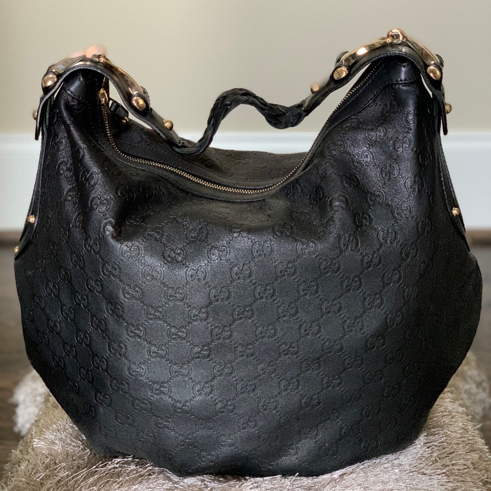 Gucci Monogram Embossed Hobo. (Leather)